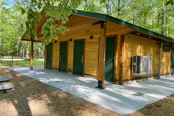 Cedar restroom facility at Northwest River Park installed by Bliss Products and Services