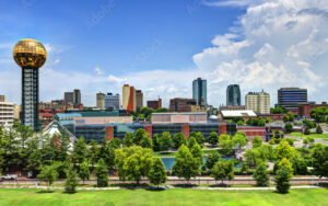 Knoxville skyline with Sunsphere and downtown buildings on a bright day, representing Bliss Products and Services’ presence in Knox County, Tennessee.