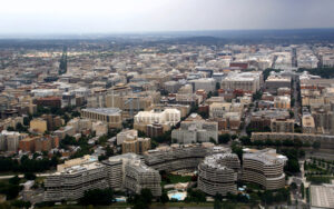 Aerial view of Foggy Bottom and Downtown Washington DC, showcasing dense urban structures and landmarks, used by Bliss Products and Services.