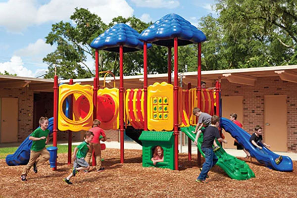 Tennessee Playground Equipment for Ages 5–12 – Bliss Products and Services Colorful outdoor playground for children ages 5–12 installed in a Tennessee park by Bliss Products and Services.