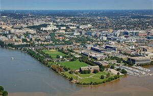 Aerial view of Southwest Washington DC waterfront and The Wharf, showcasing key civic areas and waterfront parks supported by Bliss Products and Services.