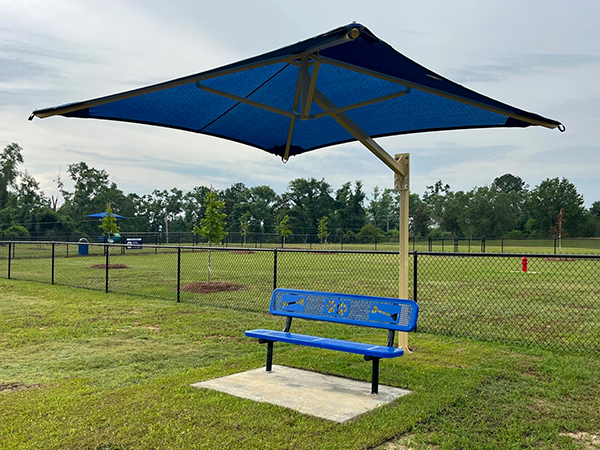 Apalachee Regional Park Dog Park Bench with Shade Umbrella – Bliss Products and Services Blue metal bench with attached shade umbrella installed at Apalachee Regional Park Dog Park in Leon County Florida