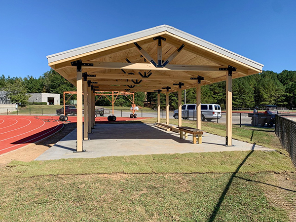 Partially constructed wooden pedestrian bridge by Bliss Products and Services at Chesapeake City Hall, Virginia