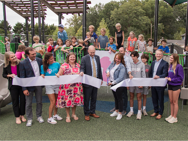 Ribbon cutting ceremony at Riverview Park’s inclusive playground in Chattanooga, Tennessee, installed by Bliss Products and Services.