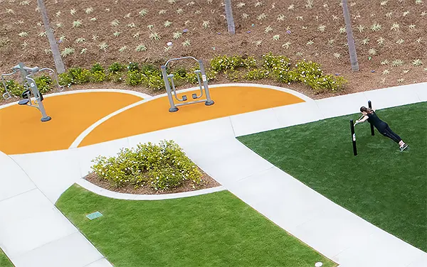 Aerial view of a fitness park with FitTech strength stations and a push-up bar