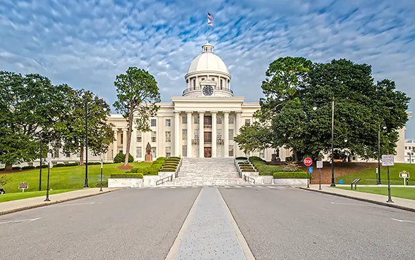 Alabama State Capitol in Montgomery with dome, columns, and front steps, used by Bliss Products and Services on the Alabama page