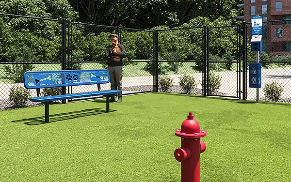 barkpark-dog-park-bench-with-bone-panel-and-waste-station-and-fire-hydrant Dog-park bench with bone panel next to a pet waste station and red fire hydrant