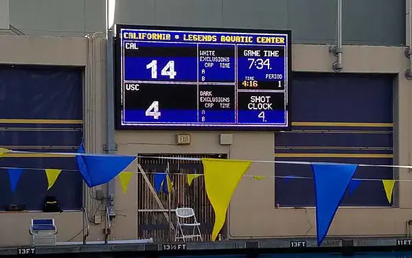 Wall-mounted water polo numeric scoreboard showing game time, shot clock, and exclusions in Cullman Alabama.
