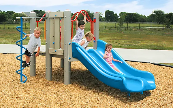 Preschool playground with a blue double slide in Choctaw County, Alabama, available from Bliss Products and Services.