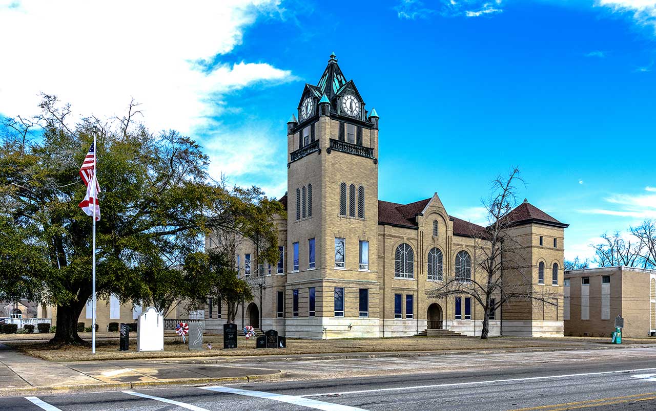 Colorful sunset view of downtown Nashville skyline reflecting on the Cumberland River, symbolizing vibrant Tennessee communities served by Bliss Products and Services