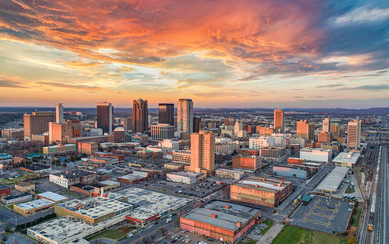 Birmingham skyline at sunset for the Alabama overview by Bliss Products and Services.