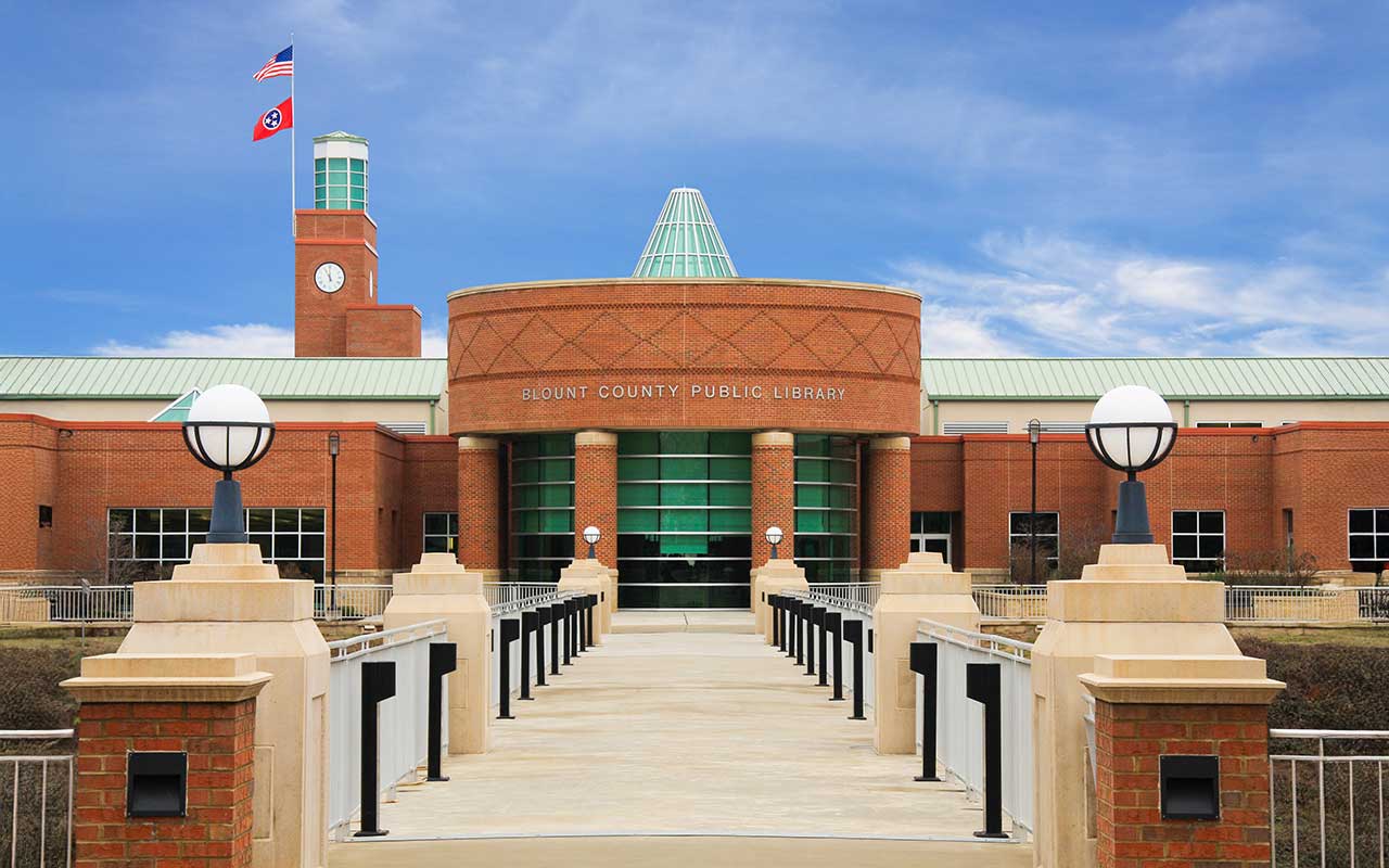 Colorful sunset view of downtown Nashville skyline reflecting on the Cumberland River, symbolizing vibrant Tennessee communities served by Bliss Products and Services