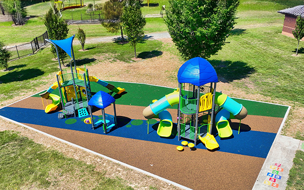 Eastway2 Player reaches under the basket for a reverse layup