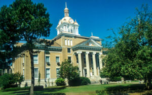 Fayette County Courthouse in Fayette, Alabama, historic dome and columned facade. Used by Bliss Products and Services.
