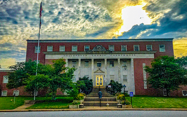 Tallapoosa County Courthouse in Alabama with brick exterior and formal entrance, for Bliss Products and Services.