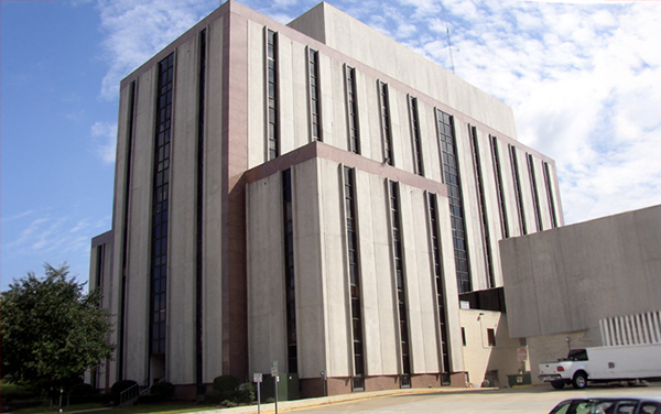 Tuscaloosa County Courthouse in Tuscaloosa, Alabama, with tall concrete façade, for Bliss Products and Services.