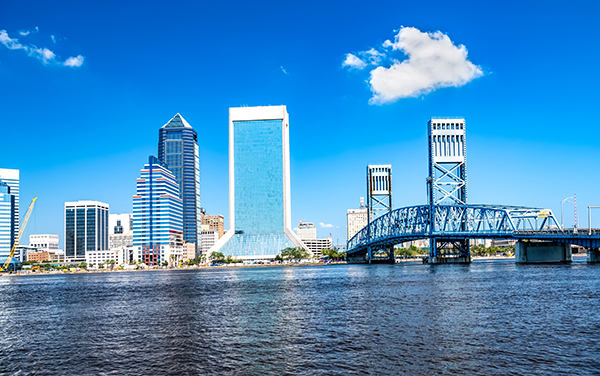 Jacksonville Main Street Bridge, First Coast Florida | Bliss Products and Services Jacksonville skyline with the blue Main Street Bridge over the St. Johns River, First Coast Florida, Bliss Products and Services