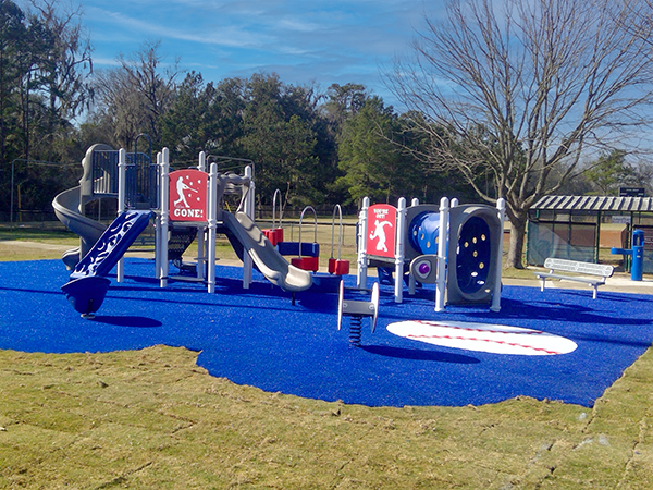 Blue Poured In Place Safety Surfacing for Georgia Playground Blue poured in place safety surfacing around a baseball themed playground in Georgia installed by Bliss Products and Services