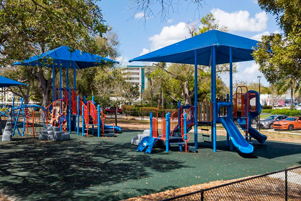 Multiple playground structures with shade canopy layout in Cape Coral Florida