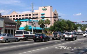 Gainesville, Florida streetscape near 13th Street and University Avenue, representing Alachua County communities in the Jacksonville and Gainesville territory.