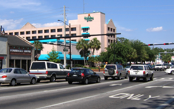 Gainesville, Florida streetscape near 13th Street and University Avenue, representing Alachua County communities in the Jacksonville and Gainesville territory.