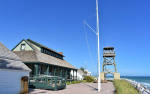 House of Refuge at Gilbert’s Bar on Hutchinson Island in Martin County, Florida, with the historic building, lifeguard tower, and Atlantic shoreline.