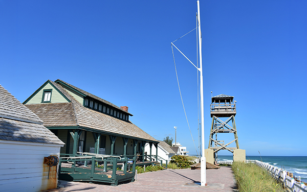 House of Refuge at Gilbert’s Bar on Hutchinson Island in Martin County, Florida, with the historic building, lifeguard tower, and Atlantic shoreline.