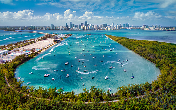 Aerial view of Biscayne Bay and the Miami skyline from Virginia Key representing Patty Carruthers’ Southeast Florida / Miami territory for Bliss Products and Services