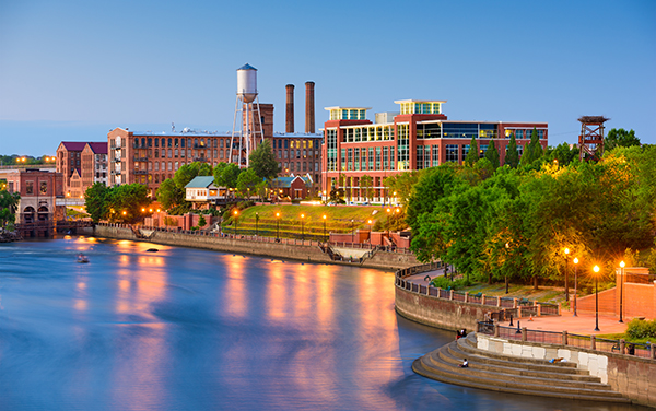 Columbus Georgia downtown skyline along the Chattahoochee River representing Ron Harley’s Georgia territory for Bliss Products and Services