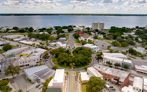 Aerial view of downtown Sebring and an inland lake community in Florida