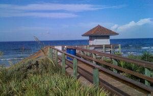 Beach access boardwalk and ocean view on Hutchinson Island in St. Lucie County, Florida.