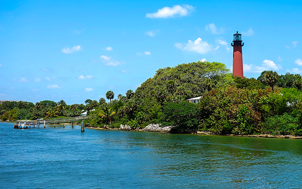 Jupiter Inlet Lighthouse viewed from the waterfront near the Loxahatchee River and Jupiter Sound in northern Palm Beach County, Florida.