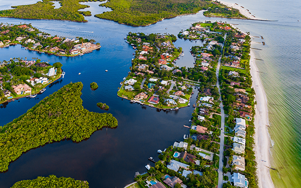 Aerial view of Naples coastline and waterways in Collier County, Florida