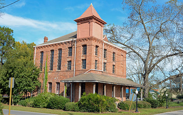 Old Berrien County Jail in Nashville, Georgia, representing historic civic character in Berrien County for Bliss Products and Services.