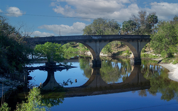 Old Peace River Bridge over the water in Arcadia, Florida