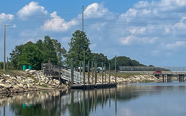 St. Cloud Canal embarkment with calm water and shoreline access in Osceola County, Florida.