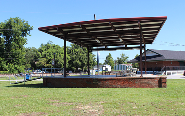 Open-air stage with accessible ramps and lawn at Blackshear City Park in Pierce County, Georgia, featured by Bliss Products and Services