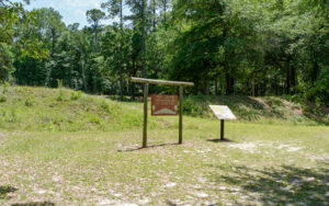 Historic Camp Lawton earthworks and interpretive signs at Magnolia Springs State Park in Jenkins County, Georgia