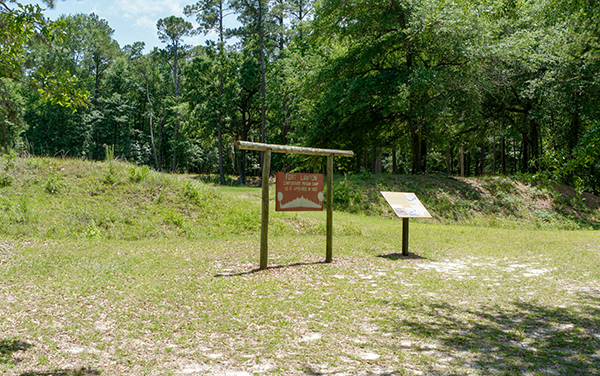 Historic Camp Lawton earthworks and interpretive signs at Magnolia Springs State Park in Jenkins County, Georgia