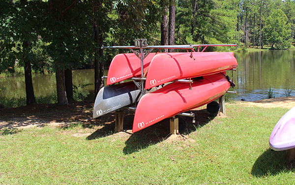 Canoes beside the lake at General Coffee State Park in Coffee County, Georgia.