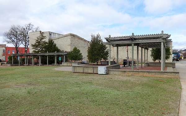 Open lawn, pergolas and seating at Charlie Jackson Sr. Unity Park in Montezuma, Georgia