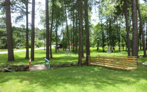 Wooden footbridges, open lawn and recreation area at Cumbee Park in Ocilla, Georgia