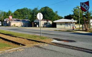 Cusseta, Georgia, showing local buildings, a road intersection, and railroad tracks in Chattahoochee County.