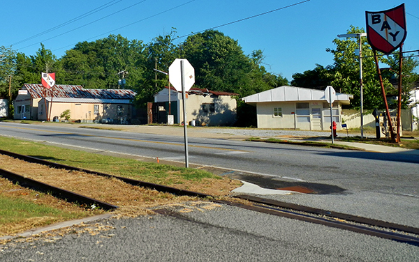 Cusseta, Georgia, showing local buildings, a road intersection, and railroad tracks in Chattahoochee County.