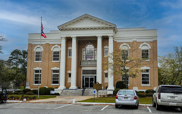 Historic Dodge County Courthouse with classical columns in Eastman, Georgia