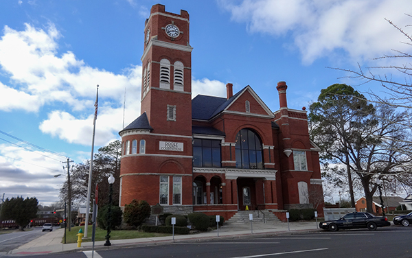 Historic red-brick Dooly County Courthouse with clock tower in Vienna, Georgia