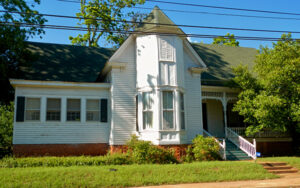 Historic Dr. Thomas B. Miller House with white exterior and bay window in Richland, Stewart County, Georgia