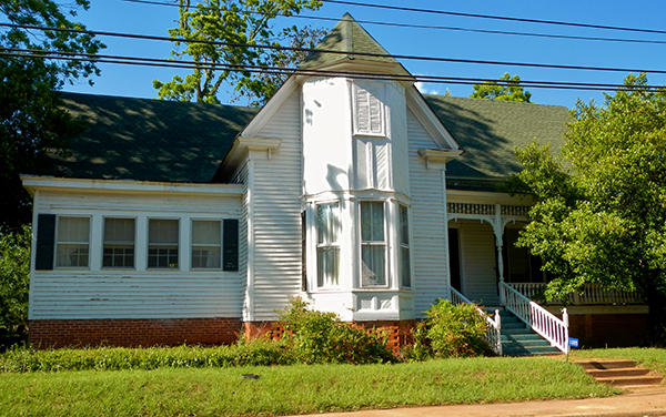 Historic Dr. Thomas B. Miller House with white exterior and bay window in Richland, Stewart County, Georgia