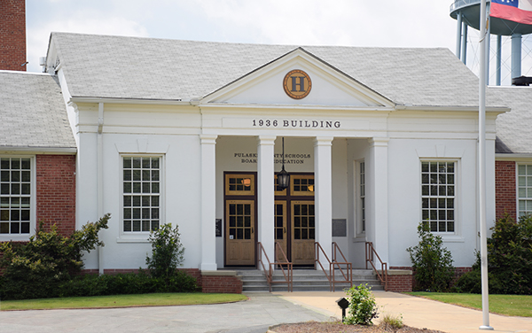 Historic 1936 Hawkinsville Public School building with columned entrance in Pulaski County, Georgia