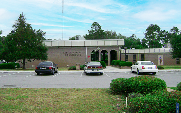 Lanier County Courthouse exterior in Lakeland, Georgia, with the county name displayed on the building